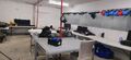 Billede af safezone i container med lejemasker yderst til højre.